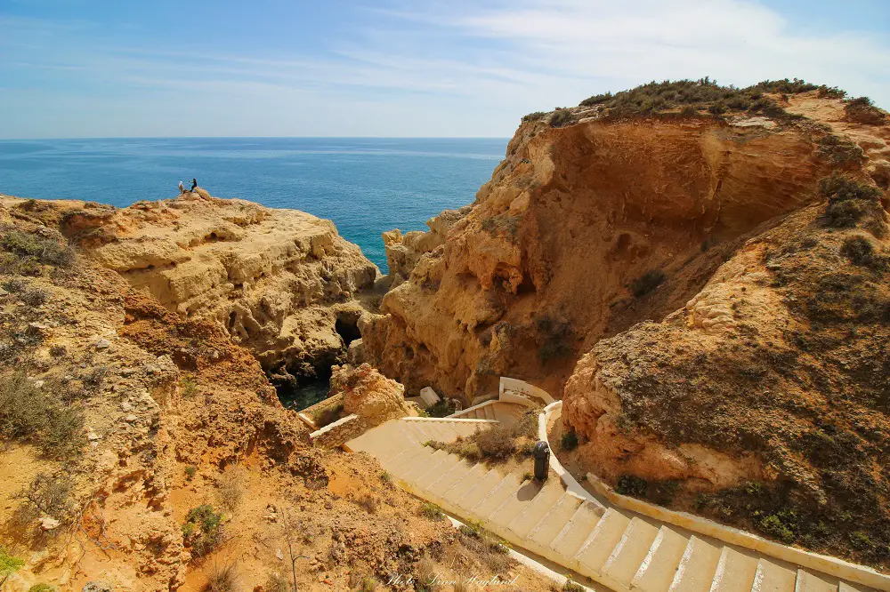 The stairs down to the natural pool in Algar Seco at the end of Carvoeiro boardwalk